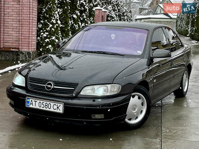 Черный Опель Омега, объемом двигателя 2.2 л и пробегом 290 тыс. км за 2350 $, фото 1 на Automoto.ua