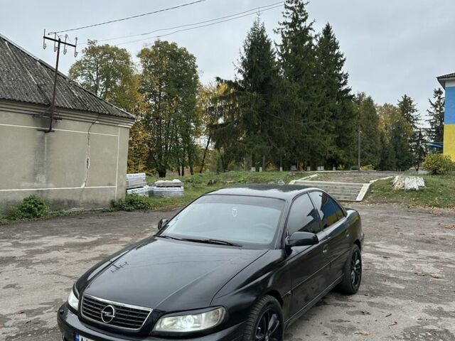 Чорний Опель Омега, об'ємом двигуна 3.2 л та пробігом 340 тис. км за 2098 $, фото 1 на Automoto.ua