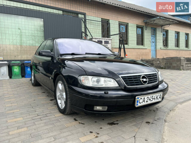 Черный Опель Омега, объемом двигателя 2.5 л и пробегом 280 тыс. км за 4300 $, фото 1 на Automoto.ua