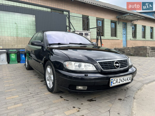 Черный Опель Омега, объемом двигателя 2.5 л и пробегом 280 тыс. км за 4300 $, фото 1 на Automoto.ua