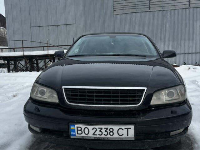 Черный Опель Омега, объемом двигателя 2.6 л и пробегом 245 тыс. км за 2600 $, фото 1 на Automoto.ua