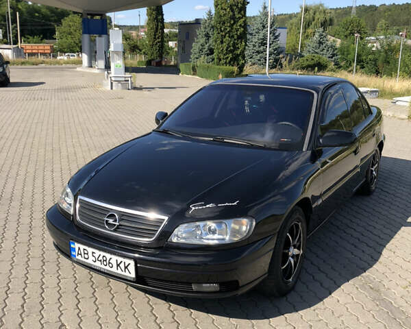 Чорний Опель Омега, об'ємом двигуна 2.2 л та пробігом 467 тис. км за 4000 $, фото 1 на Automoto.ua