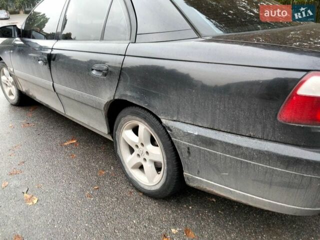 Чорний Опель Омега, об'ємом двигуна 2.2 л та пробігом 333 тис. км за 2200 $, фото 1 на Automoto.ua