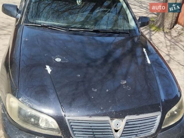 Черный Опель Омега, объемом двигателя 2.2 л и пробегом 250 тыс. км за 1800 $, фото 1 на Automoto.ua
