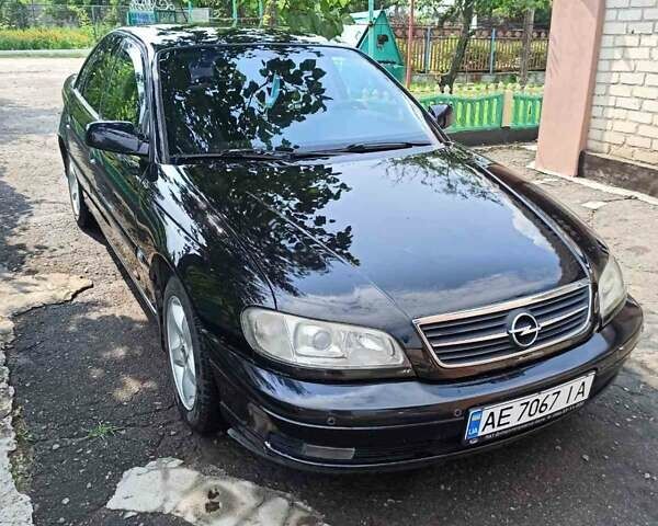 Черный Опель Омега, объемом двигателя 2.2 л и пробегом 304 тыс. км за 4000 $, фото 1 на Automoto.ua