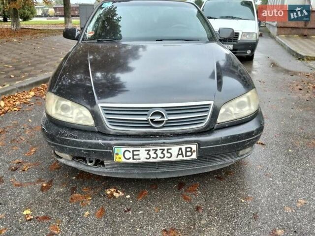 Опель Омега 2003 в Каменце-Подольском на Automoto.ua Черный Опель Омега, объемом двигателя 2.2 л и пробегом 220 тыс. км за 2500 $, фото 1 на Automoto.ua