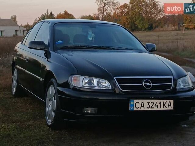 Опель Омега 2003 в Черкассах на Automoto.ua Черный Опель Омега, объемом двигателя 2.17 л и пробегом 273 тыс. км за 4200 $, фото 1 на Automoto.ua