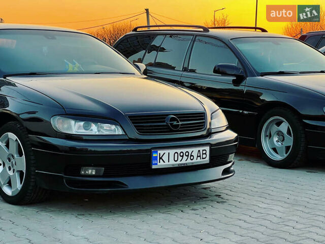 Чорний Опель Омега, об'ємом двигуна 2.2 л та пробігом 335 тис. км за 4000 $, фото 1 на Automoto.ua