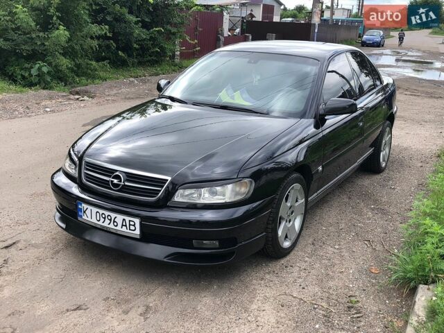 Чорний Опель Омега, об'ємом двигуна 2.2 л та пробігом 345 тис. км за 3800 $, фото 1 на Automoto.ua