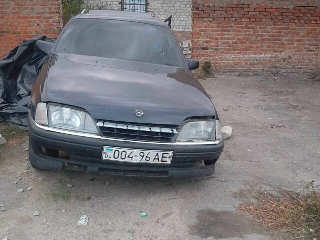 Черный Опель Омега, объемом двигателя 2.6 л и пробегом 300 тыс. км за 500 $, фото 1 на Automoto.ua