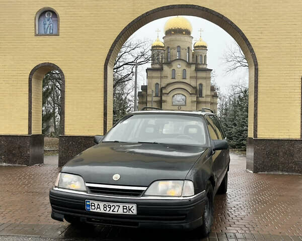 Чорний Опель Омега, об'ємом двигуна 2 л та пробігом 262 тис. км за 1000 $, фото 1 на Automoto.ua