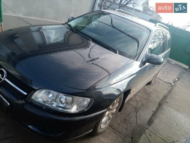 Черный Опель Омега, объемом двигателя 2 л и пробегом 140 тыс. км за 2500 $, фото 1 на Automoto.ua