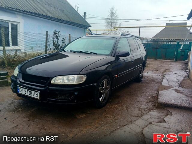 Черный Опель Омега, объемом двигателя 2.5 л и пробегом 181 тыс. км за 1200 $, фото 1 на Automoto.ua