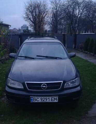 Черный Опель Омега, объемом двигателя 2.5 л и пробегом 380 тыс. км за 2150 $, фото 1 на Automoto.ua