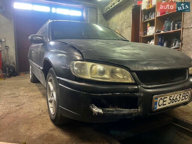 Чорний Опель Омега, об'ємом двигуна 2 л та пробігом 240 тис. км за 800 $, фото 1 на Automoto.ua
