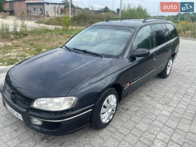 Чорний Опель Омега, об'ємом двигуна 2 л та пробігом 300 тис. км за 800 $, фото 1 на Automoto.ua
