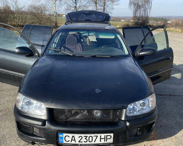Черный Опель Омега, объемом двигателя 2 л и пробегом 289 тыс. км за 1300 $, фото 1 на Automoto.ua