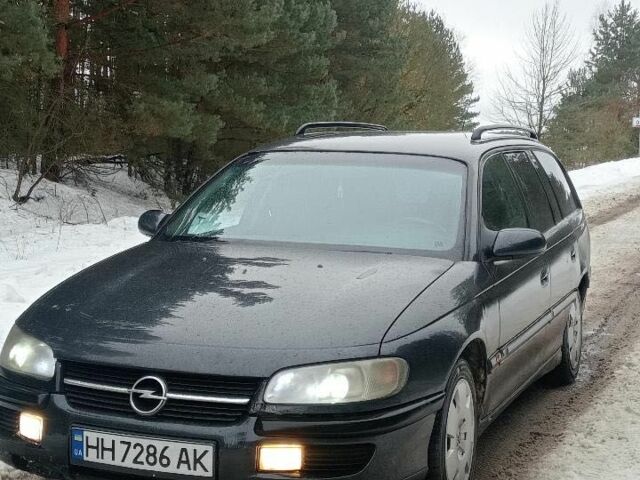 Черный Опель Омега, объемом двигателя 2 л и пробегом 387 тыс. км за 1900 $, фото 1 на Automoto.ua