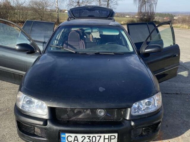 Чорний Опель Омега, об'ємом двигуна 0 л та пробігом 188 тис. км за 1200 $, фото 1 на Automoto.ua