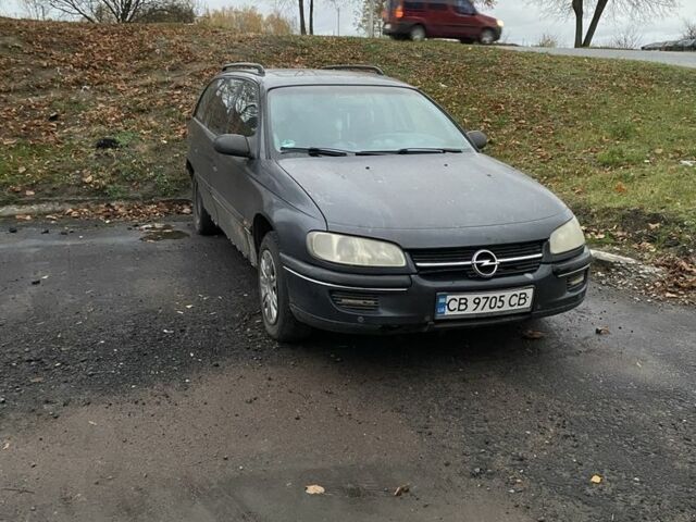 Черный Опель Омега, объемом двигателя 2 л и пробегом 320 тыс. км за 1200 $, фото 1 на Automoto.ua