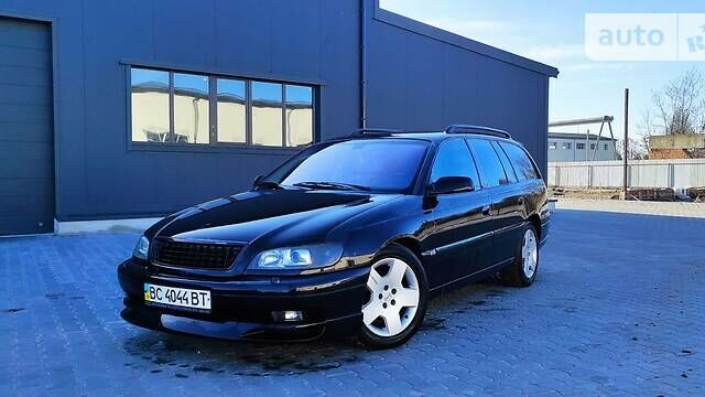 Черный Опель Омега, объемом двигателя 2.5 л и пробегом 288 тыс. км за 4800 $, фото 1 на Automoto.ua