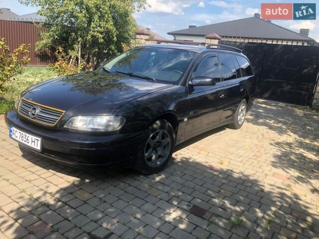 Черный Опель Омега, объемом двигателя 2.2 л и пробегом 395 тыс. км за 3400 $, фото 1 на Automoto.ua