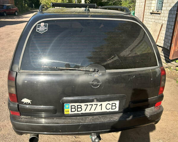Черный Опель Омега, объемом двигателя 2.5 л и пробегом 350 тыс. км за 3500 $, фото 1 на Automoto.ua