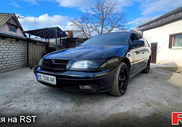 Чорний Опель Омега, об'ємом двигуна 2.2 л та пробігом 260 тис. км за 3100 $, фото 1 на Automoto.ua