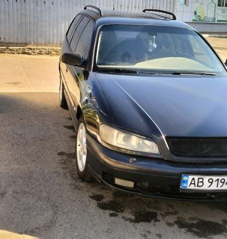Черный Опель Омега, объемом двигателя 2.2 л и пробегом 290 тыс. км за 2499 $, фото 1 на Automoto.ua