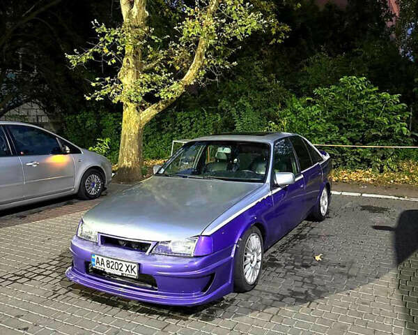 Фіолетовий Опель Омега, об'ємом двигуна 2 л та пробігом 296 тис. км за 1999 $, фото 1 на Automoto.ua