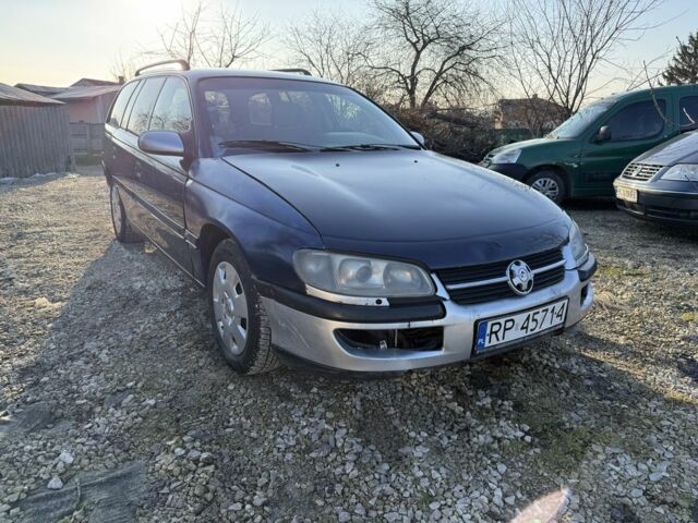 Фиолетовый Опель Омега, объемом двигателя 2.5 л и пробегом 222 тыс. км за 999 $, фото 1 на Automoto.ua