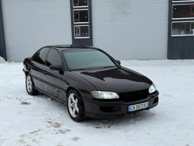 Коричневый Опель Омега, объемом двигателя 2 л и пробегом 185 тыс. км за 1650 $, фото 1 на Automoto.ua