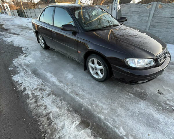 Коричневий Опель Омега, об'ємом двигуна 2 л та пробігом 220 тис. км за 2750 $, фото 1 на Automoto.ua
