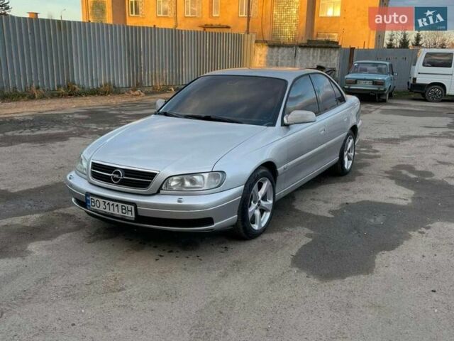 Коричневый Опель Омега, объемом двигателя 2.2 л и пробегом 295 тыс. км за 3800 $, фото 1 на Automoto.ua