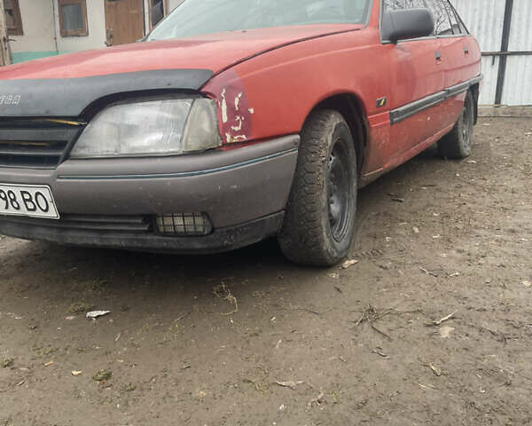 Красный Опель Омега, объемом двигателя 1.8 л и пробегом 255 тыс. км за 463 $, фото 1 на Automoto.ua
