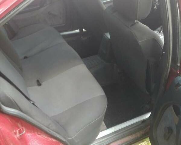 Красный Опель Омега, объемом двигателя 2.4 л и пробегом 290 тыс. км за 1300 $, фото 1 на Automoto.ua