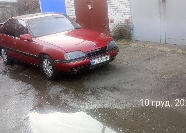 Червоний Опель Омега, об'ємом двигуна 2 л та пробігом 400 тис. км за 1200 $, фото 1 на Automoto.ua