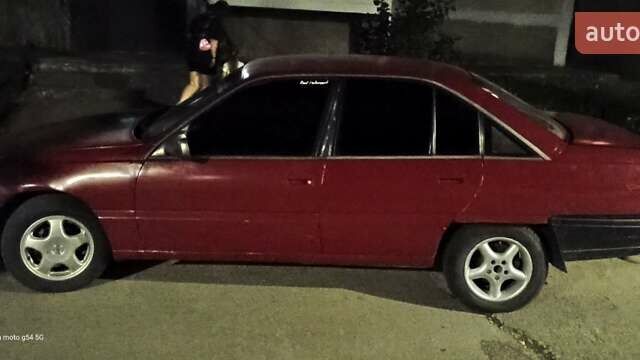 Червоний Опель Омега, об'ємом двигуна 2 л та пробігом 350 тис. км за 900 $, фото 1 на Automoto.ua