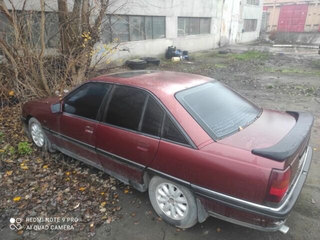 Красный Опель Омега, объемом двигателя 2.6 л и пробегом 320 тыс. км за 1000 $, фото 1 на Automoto.ua