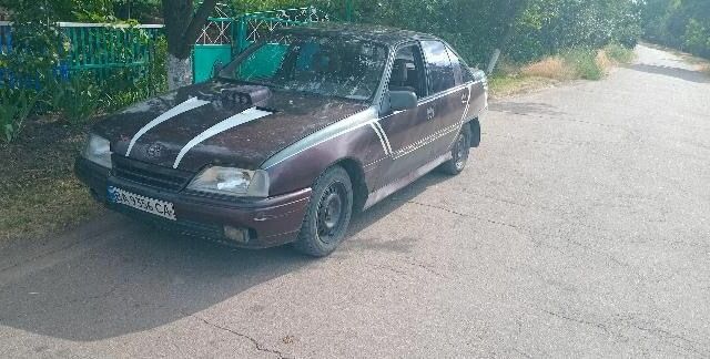 Червоний Опель Омега, об'ємом двигуна 2 л та пробігом 3 тис. км за 856 $, фото 1 на Automoto.ua