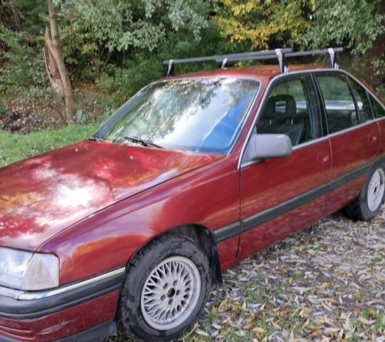 Красный Опель Омега, объемом двигателя 2 л и пробегом 280 тыс. км за 1900 $, фото 1 на Automoto.ua