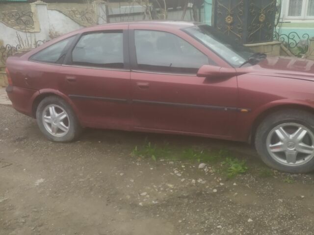 Червоний Опель Омега, об'ємом двигуна 2 л та пробігом 150 тис. км за 461 $, фото 1 на Automoto.ua