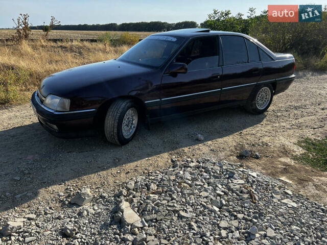 Красный Опель Омега, объемом двигателя 2.6 л и пробегом 200 тыс. км за 2300 $, фото 1 на Automoto.ua