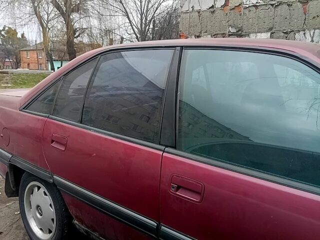 Красный Опель Омега, объемом двигателя 2 л и пробегом 420 тыс. км за 800 $, фото 1 на Automoto.ua