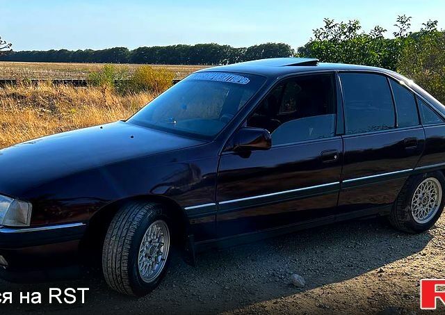 Красный Опель Омега, объемом двигателя 2.6 л и пробегом 285 тыс. км за 1950 $, фото 1 на Automoto.ua