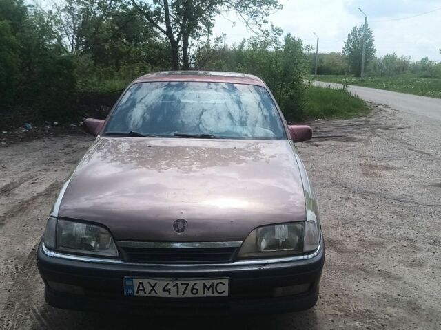 Красный Опель Омега, объемом двигателя 2.3 л и пробегом 300 тыс. км за 1400 $, фото 1 на Automoto.ua
