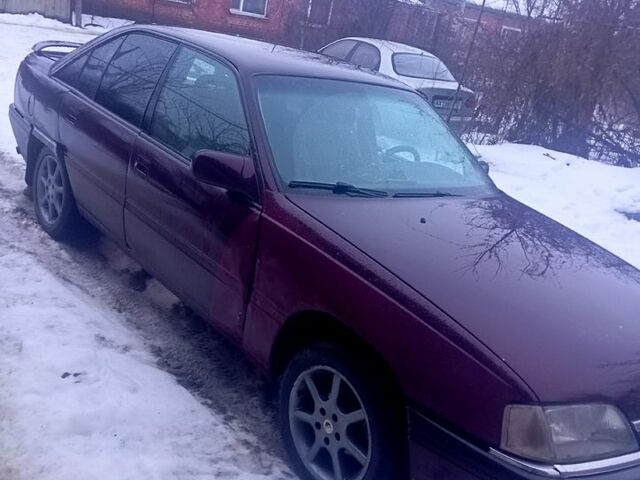 Червоний Опель Омега, об'ємом двигуна 2 л та пробігом 300 тис. км за 1000 $, фото 1 на Automoto.ua