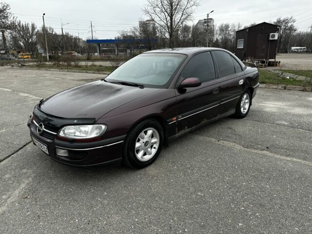 Червоний Опель Омега, об'ємом двигуна 2.5 л та пробігом 390 тис. км за 1500 $, фото 1 на Automoto.ua