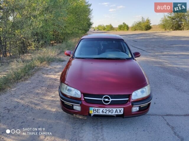 Красный Опель Омега, объемом двигателя 2 л и пробегом 485 тыс. км за 2300 $, фото 1 на Automoto.ua