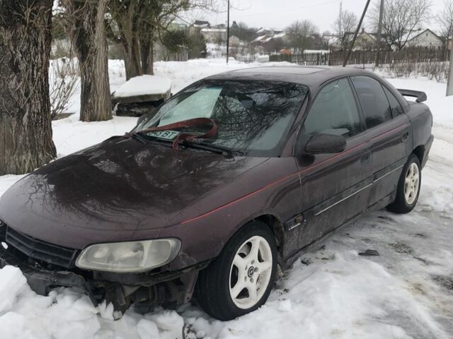 Красный Опель Омега, объемом двигателя 2.5 л и пробегом 200 тыс. км за 650 $, фото 1 на Automoto.ua